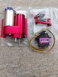 صندوق تروس (Gearbox) معدني بسرعتين مع محرك ومؤازر (Servo) مصمم لسيارات...