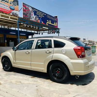 دوج كاليبر 2009 رقم بغداد هزه جديده محرك وكير شرط  السياره جاهزه مايعو...