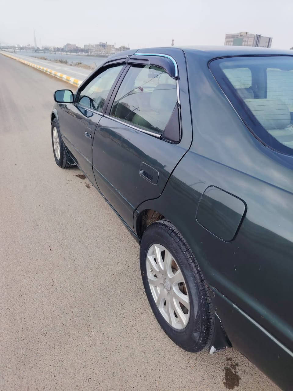 كامري للبيع موديل 2000  محرك 2000 ابو الكف جديد كير جديد  وارد امريكي حدادية كهربائيات كلشي جاهز تبريد ثلج تخم تاير جديد دوشمة جلد ارضية جلد صبغ عام جمالية فقط سيارة نضيفة وخير من الله رقم بصرة سعر 57 وبيه مجال ناصرية مركز ***********

