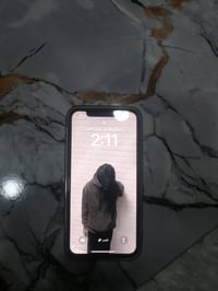 آيفون XS ٦٤ • بطاريه مبدله ١٠٠ • نضيف