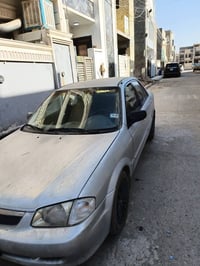 مازدا ٣٢٣ • موديل ٢٠٠٠ • بحاجة تصليح