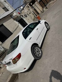 كورلا 2009محدث 2013 سنويه جديده سياره باسمي حداديه جديده تبريد تدفىئه ...