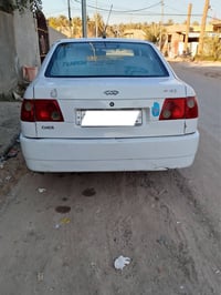 سيارة شيري كوين 2009 سياره نضيفة تبريد شغال -الرقم انگليزي بغداد-  گير...