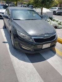 اخوان سيارة كيا اوبتما موديل 2014 وارد كوري خطين محرك 2000 رقم بغداد ب...