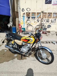 دراجة نارية • موديل 25 • كفالة عامة