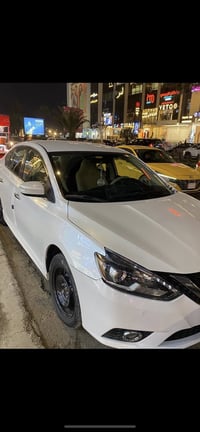 للبيع نسيان سنترا 2019 ‎ رقم بغداد ابيض صدفي SR ‎مواصفات بصمه وبصمه اب...