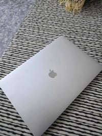 ماك بوك برو  معالج i9 9980HQ  رام 16g ddr4  هارد m.2 1tb 1000g  كارت ش...