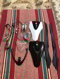 قطع غيار • توصيل • لؤلؤي وأسود