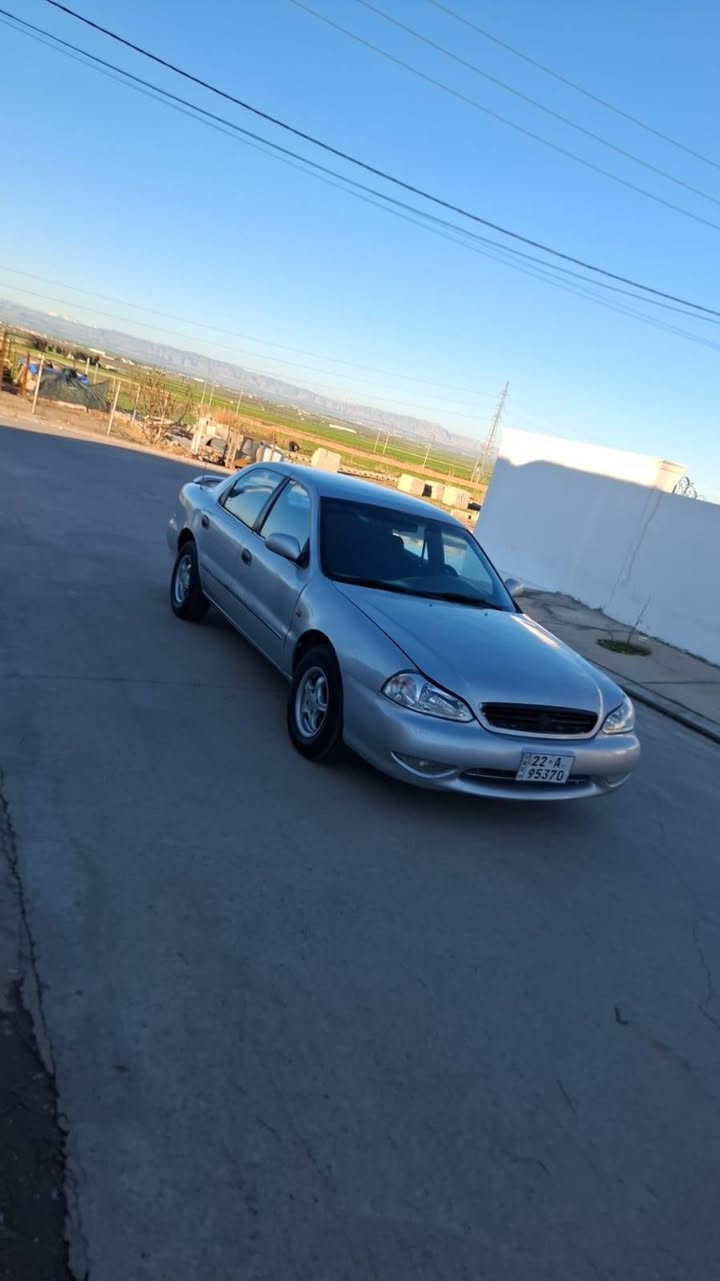 (***********) (***********) كيا كريدوس كير عادي موديل 2000  رقم اربيل رقم جديد هزة جديد سنوية جديد للغاية 2030 كير و محرك ابشرط طخم اطارات جديدة لوك طخم حدادية جديد داخل غرفتها كلش نظيفة باقية عل وضع شركة صبغ عام جمالية سعرها( 39) و مجال مكانها قضاء بردرش بين اربيل و دهوك أربيل, العراق
