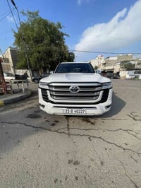 لاندكروز 2022 VXR اتوين توربو داته شو داخل احمر فول ١/١ ماشيه 47 رقم ش...