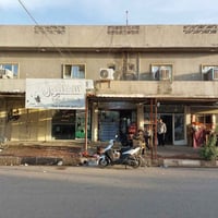 تسعين فرع البدالة • عقار تجاري ركن • ٧ محلات