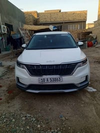 كيا كرنفال البيع مكفول الون ابيض وارد امريكا  07809716628