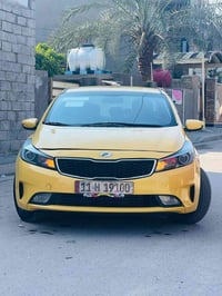 كيا فورتي ٢٠١٧ مكينه ٢٠٠٠ دوش كير AT رقم بغداد بأسمي تحويل ثاني  مصفره...