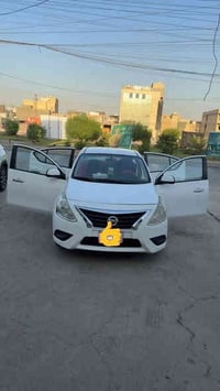 نيسان صني موديل 2019 رقم بغداد ماشيه 99 الف كير ومحرك مكفول بيها قطعتي...