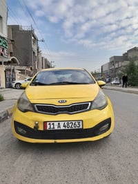كيا ريو خليجية موديل 13 بدون حادث رقم انكليزي مصفره هيئه و غرامات بأسم...