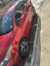 للبيع كيا فورتي رقم اربيل الجديد موديل ٢٠٢١ وارد امريكي احمر   ماشيه ٩...