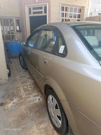 فورنزا سوزوكي 2004 تبريد شغال الصدر يحتاج دبلات رقم بغداد سنوية لل30 ا...