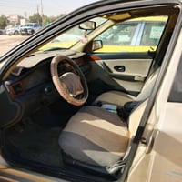 موديل 2009 محرك جديد  كير وتبريد وحداديه مكفوله ورقم نجف بيها طخات بسي...