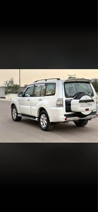 باجيرو ٢٠١٣ باسمي هزة ورقم جديد  ٦ سلندر  ثلاث قطع تبريد  كشنات جلد دم...
