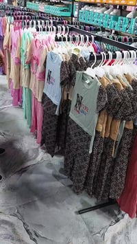 الكندي • ملابس نسائية واطفال • نجف حي الميلاد