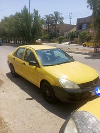 لانسر، 2010 للبيع بلادي شركه عامه رقم بغداد دولي  مكينه كير حداديه خير...