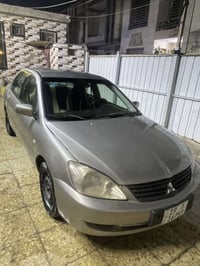 لانسر ١٦٠٠ • ٢٠١٠ • رقم كربلاء