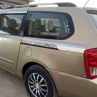 سيدونا 2011 رقم بغداد لون ذهبي  بأسمي مشروع وطني  فول كهربائي بيبان وج...