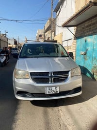 دوج كرفان 2012 عمية  كير ومكينه مكفولات  تبريد شغال  بيها ثلاث قطع سعر...