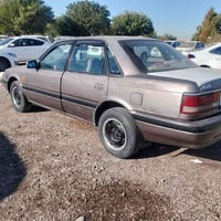 مازدا ٩٠ • مكينة ١٢ • بغداد