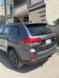 جيب ترايل هوك  موديل 2021 ماشية 46,000 mi رقم بغداد بأسمي سنوية جديدة ...