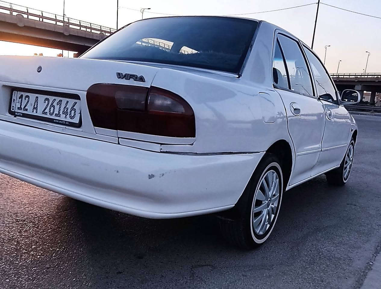 بروتون موديل 2002 للبيع (كير عادي)
​النوع: بروتون (Proton)
​الموديل: 2002
​المنظومة: كير عادي (عادي)
​اللون: أبيض
​البودي: صبغ حزم للجمالية (بدون دواخل، الدواخل سليمة تماماً).
​الأضرار: تبديل جاملغ سكن (أمامي) شغل مؤسسة.
​التبريد: شغال.
​الكهربائيات: شغال الكل، ما بيها أي نقص كهربائي.
​الميكانيك: كير ومحرك بشرط الفحص والجاهزية.
​التواير: طخم تاير جديد.
​الأوراق والتحويل: السنوية نافذة لغاية 2028، السيارة باسمي والتحويل بشرط.
​الإضافات: كوبون البانزين الإلكتروني جاهز وموجود مع السيارة.
​السعر: [ 38 ] وبيه مجال للشراي الطيب.
​المكان: نينوى / حي المطاحن الجانب الايمن 
​للاتصال والاستفسار: ***********
