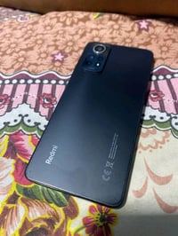 ريدمي نوت١٢برو ذاكره 256 جهاز مكفول ممفتوح اخو الجديد غراضه كامله كارت...