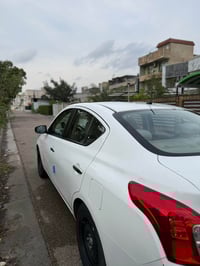 نيسان صني مصري 2024  ماشية 70 الف  رقمها اربيل  بيها طخة بنهاية باب ال...