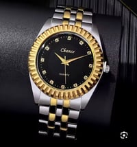 ساعة كوارتز • بسوار فولاذ • ذهبي فضي