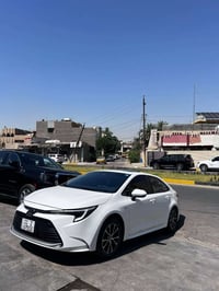 كورلا هايبرد 2025  ماشيه 37الف مكاني بغداد البلديات  سياره فول عده الك...