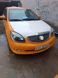 جيلي موبل كير • كورلا 1800 • رقم بغداد