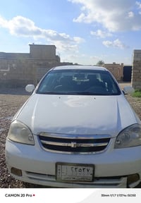 اوبترا 2011 ضربه بـ الدعاميه خفيفه  محرك مامفتوح شرط تحويل مسجله 88 وب...