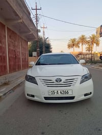 اخوان......... كامري وارد امريكييي موديل 2007  لون ابيض رقم انبار انكل...