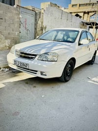 فورنزا موديل 2007  رقم بغداد دولي هزه جديد） شرط التحويل بيهه قطعتين صب...