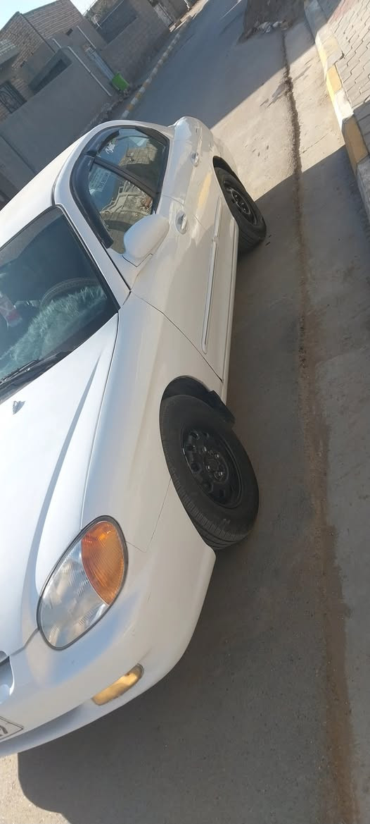 يالله سوناتا للبيع موديل ٢٠٠٠ صبغ درجه اوله كير ومحرك خير من الله مكينه ٢٠٠٠ حداديه جديده وتايرات جديده وكهرباىيات كلها شغاله باسمي ٦٢ رقمي ***********
