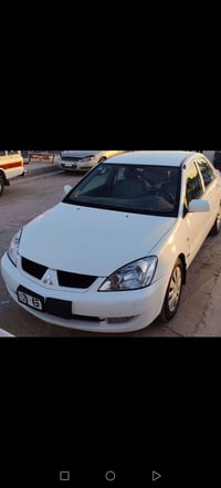 لانسر موديل 2009 للبيع مكفولة گير محرك للأستفسار اكثر الاتصال 07728197...