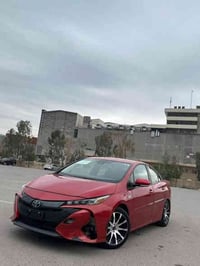 تويوتا بريوس برايم هايبرد ‏PLUGIN موديل 2022 XLE شاشه تيسلا  مرقم بغدا...