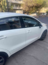 كيا ريو خليجيه 15 موديل ماكينه 1600 مصبوغ حزام رقم ربيل مكانها بغداد س...