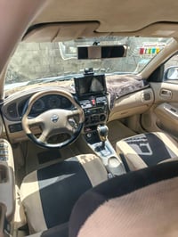 نيسان سني موديل2009 سياره حلوه مال جناي بيه بارد اثر رصعات والباب الخل...
