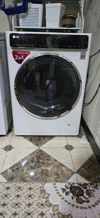 غسالة ملابس نوع LG   كوري اصلي استيراد خوشناو  وزن 10.5Kg وتجفيف 7kg م...