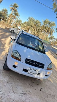 توسان ٢٠٠٩ • نص كفالة • رقم سليمانية