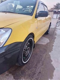 لانسر موديل 2011 امريكي حادثه طخه ليوره خفيفه تخم تأير صدر جديد صبغه  ...