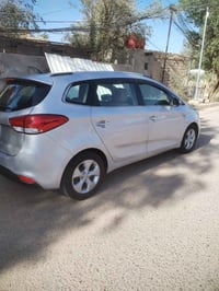 كارنز ٢٠١٤ • ٧راكب • محرك ٢٠٠٠