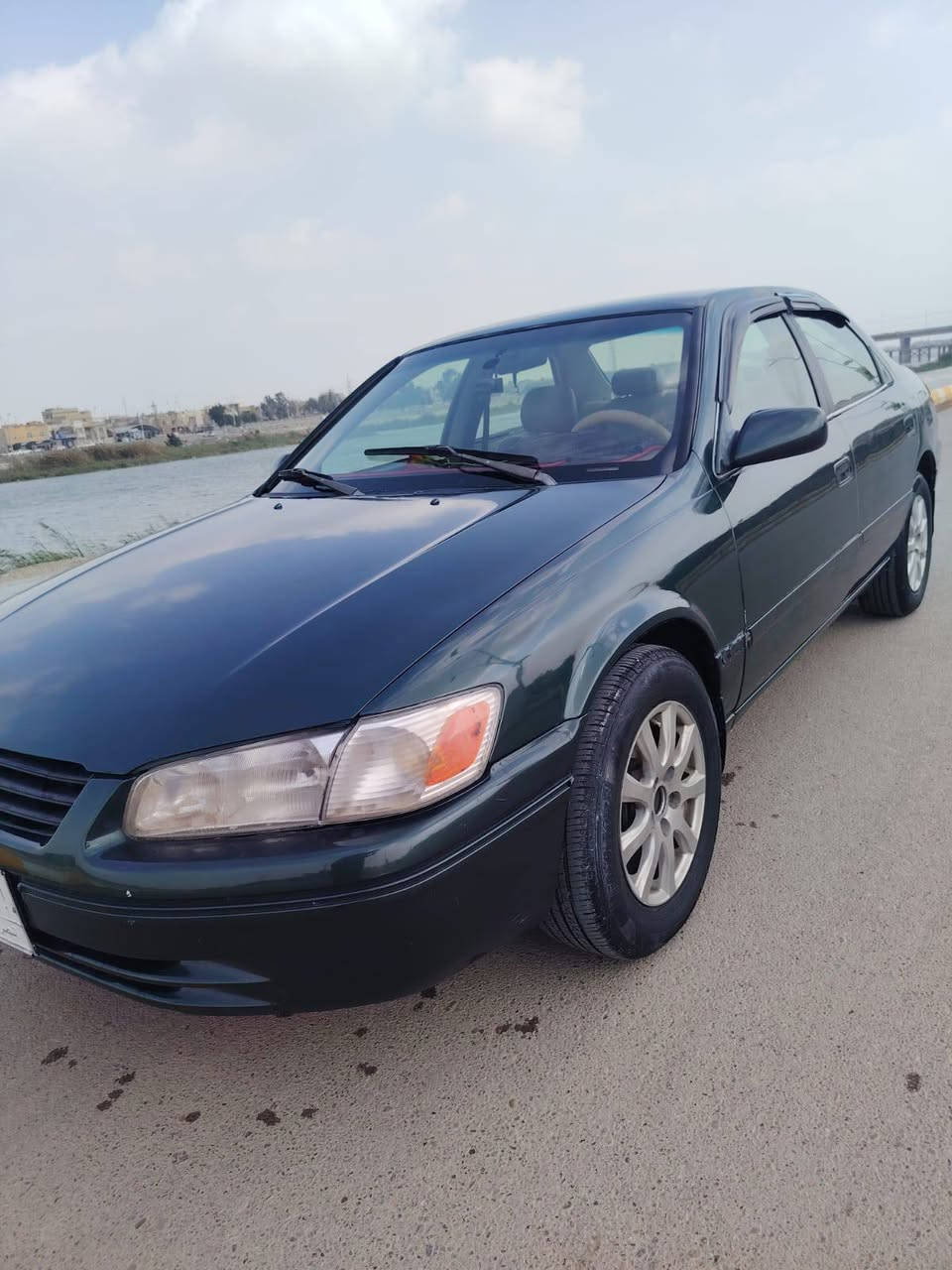 كامري للبيع موديل 2000  محرك 2000 ابو الكف جديد كير جديد  وارد امريكي حدادية كهربائيات كلشي جاهز تبريد ثلج تخم تاير جديد دوشمة جلد ارضية جلد صبغ عام جمالية فقط سيارة نضيفة وخير من الله رقم بصرة سعر 57 وبيه مجال ناصرية مركز ***********
