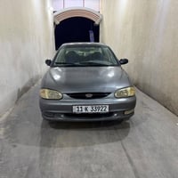 كيا سيفيا • سيفيا 2001 • سيارة اوتوماتيك • كيا رقم بغداد • سيارة مصبوغ...